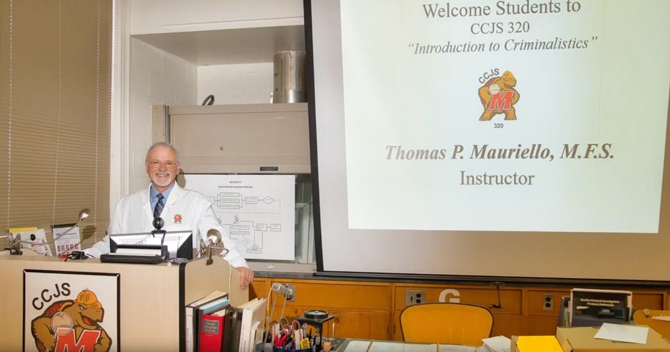 Thomas Mauriello teaching in classroom
